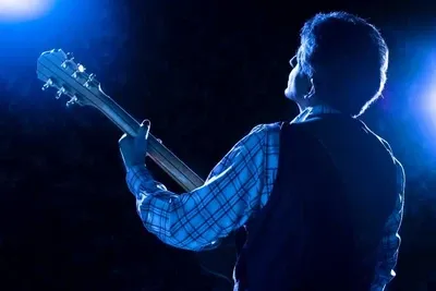 Guitarist on stage at NACMAI Week Pigeon Forge entertainment